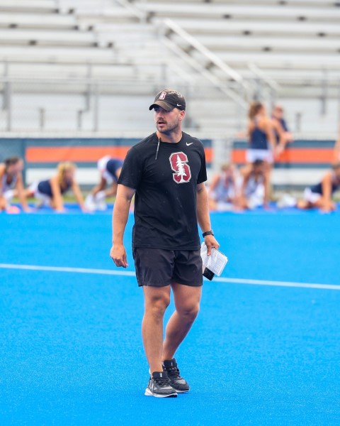 Doug Haugh coaching athlete at Stanford University Athletics